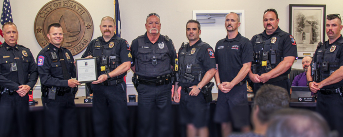 Heath DPS officers receiving Life Saving Award.
