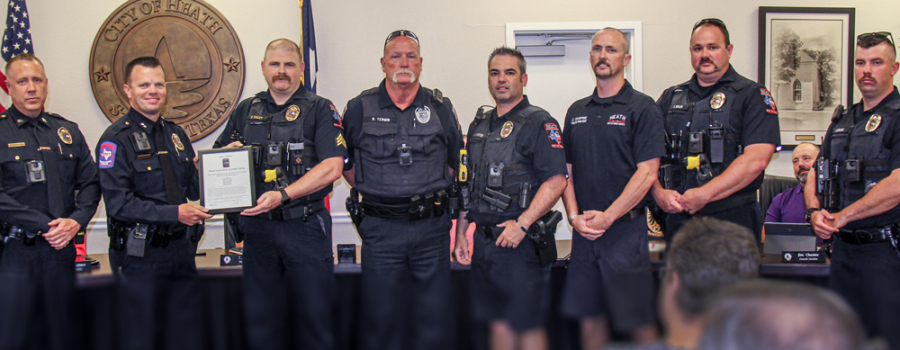 Heath DPS officers receiving Life Saving Award.