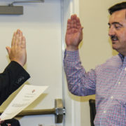 John Main gets sworn in by Rockwall County Judge David Sweet.