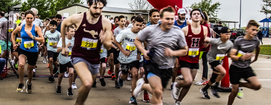 Runners starting the Heart of Heath 5k