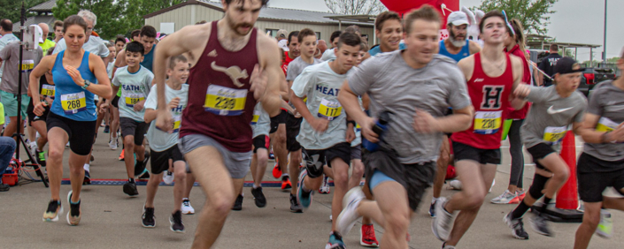 Runners starting line at Heart of Heath 5k