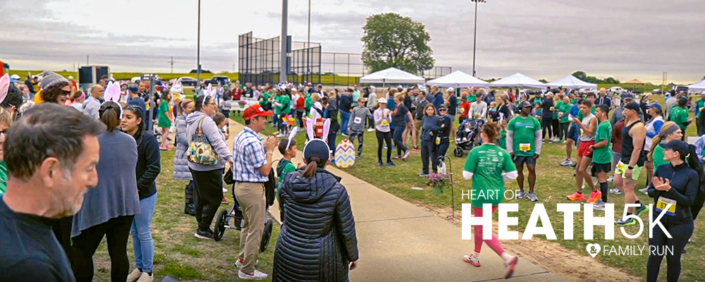 Crowd at the finish line of the 2023 Heart of Heath Run