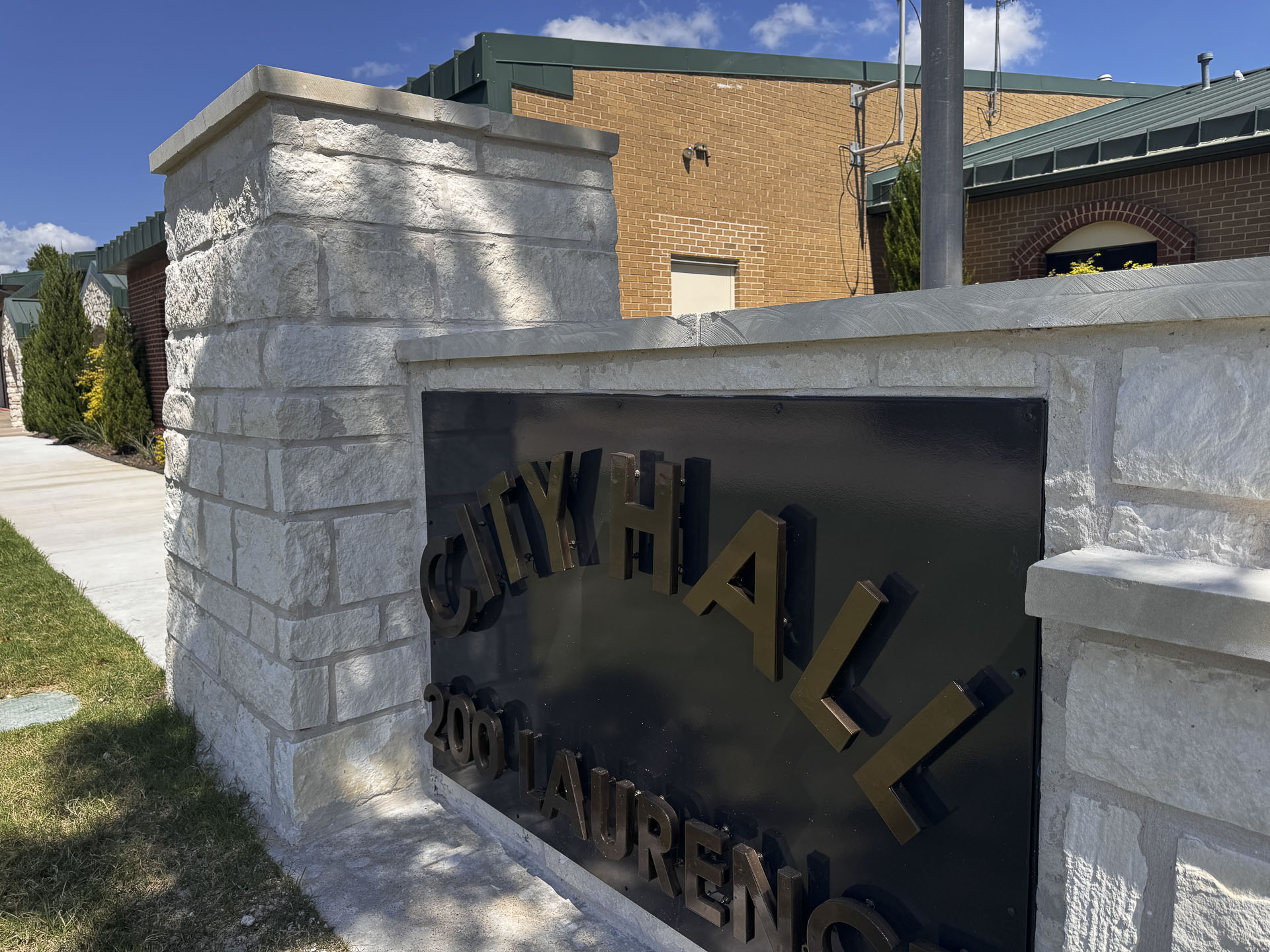 The new City Hall stone monument sign which was donated by an anonymous donor.