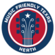 MusicFriendlyCity Circular logo featuring a red guitar silhouette with blue musical elements, surrounded by a dark blue border reading “Music Friendly Texas” and “Heath.”