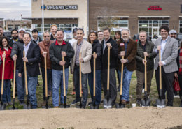 Participants with shovels at the Plaza Park groundbreaking.