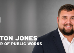 Headshot of new City of Heath Director of Public Works Preston Jones, on a gray background with the City logo.