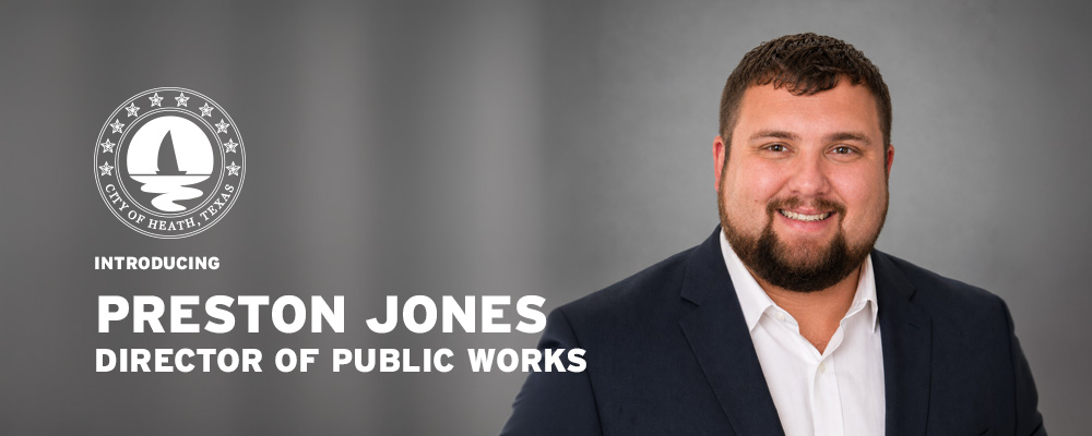 Headshot of new City of Heath Director of Public Works Preston Jones, on a gray background with the City logo.