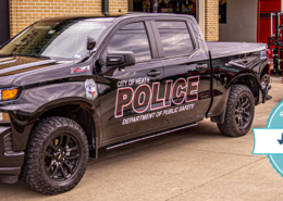 Heath DPS vehicle parked outside DPS building.