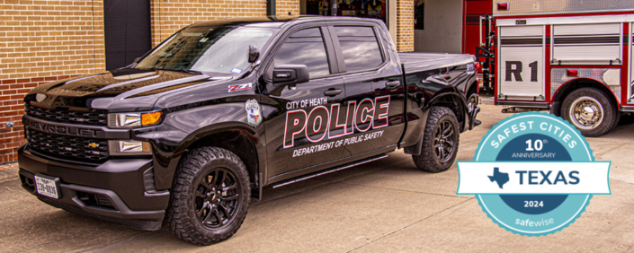 Heath DPS vehicle parked outside DPS building.