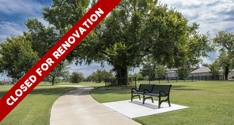 Park trail and bench at Towne Center Park