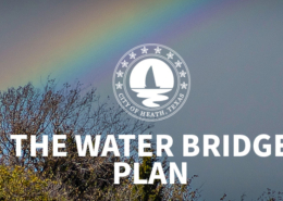 The North Water Tower in the City of Heath, with a blue sky in the background.