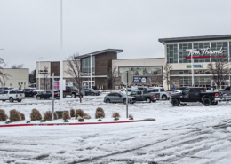 Tom Thumb parking lot covered with snow and the store in the background.