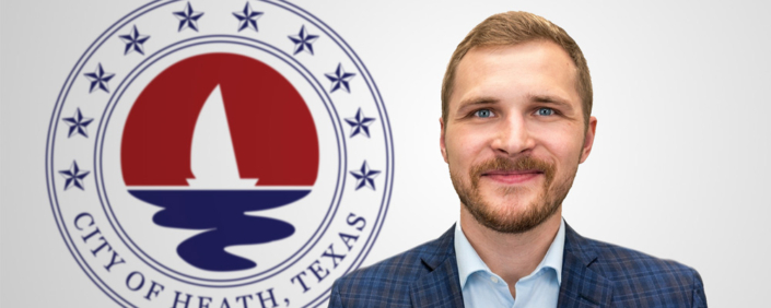 Zack King Headshot of Zack King, Director of Planning and Development, standing in front of the City of Heath, Texas official seal.