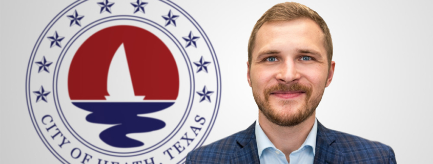 Headshot of Zack King, Director of Planning and Development, standing in front of the City of Heath, Texas official seal.
